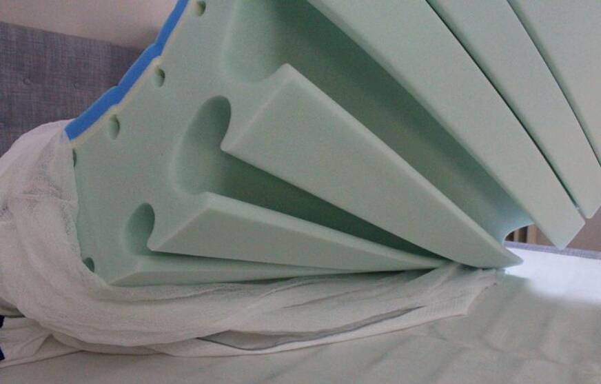 Cold foam mattress with contour zones